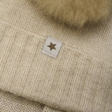 HUTTEliHUT – Czapeczka z wełny merino z pomponem z alpaki, Sand Melange