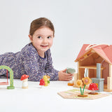 Tender Leaf Toys - Przenośny, leśny domek z wyposażeniem i laleczkami