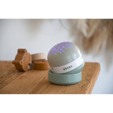 Beaba - Projektor gwiazd z pozytywką i czujnikiem płaczu Pixie, Sage green