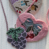 Konges Slojd - Dziecięca torebka w kształcie serca na ramię wisienkami Amarena