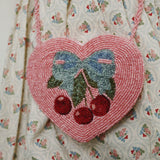 Konges Slojd - Dziecięca torebka w kształcie serca na ramię wisienkami Amarena