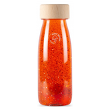 Petit Boum - Butelka sensoryczna FLOAT pomarańczowa